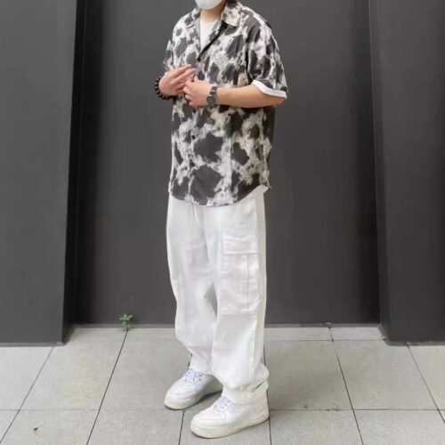 Loose Fitting Casual Straight Leg Cargo Pants With Multiple Pockets And A Drawstring Waist