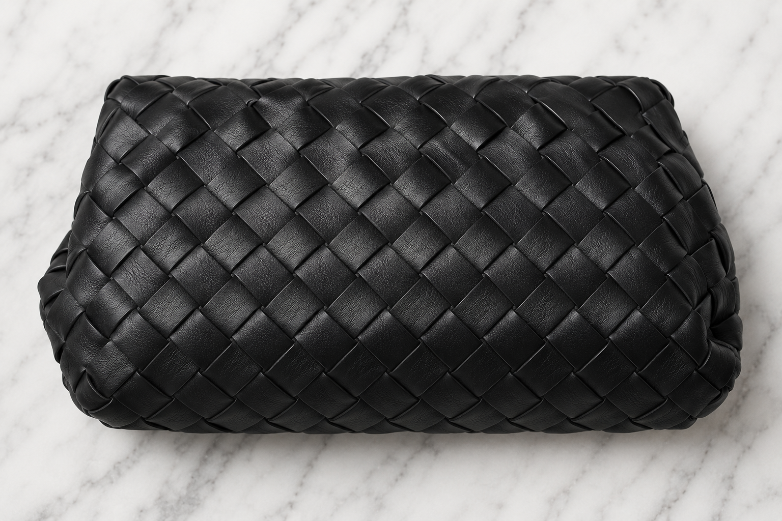 Artisanal woven leather — Bottega Veneta investment piece